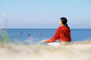 LT - how to use - meditation2 woman meditating on beach